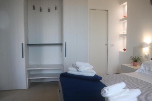 Postel nebo postele na pokoji v ubytování B&B Naiadi Anzio