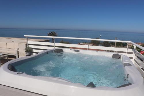 a hot tub on the deck of a boat at B&B Naiadi Anzio in Anzio