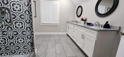 a bathroom with a sink and a shower at Majestic Retreat in Sevierville
