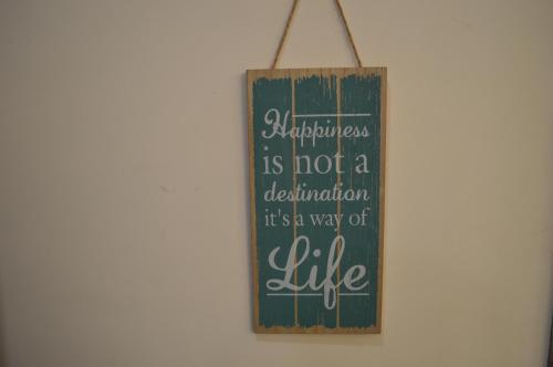 a sign that says kindness is not a declaration its a way of life at Ananta Square - Rishikesh 1BHK in Rishīkesh