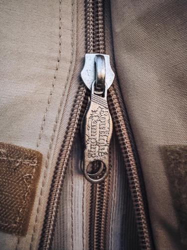 a close up of a zipper of a bag at Ferde Kemping és Apartment in Kapolcs