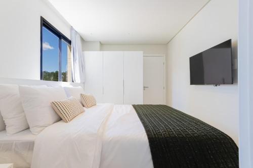 Tolive Riverside HOUSI by Carpediemにあるテレビまたはエンターテインメントセンター