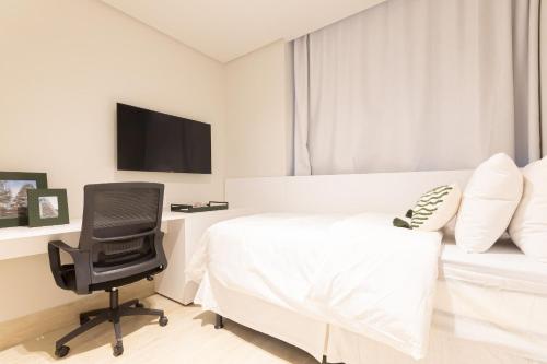 Tolive Riverside HOUSI by Carpediemにあるテレビまたはエンターテインメントセンター