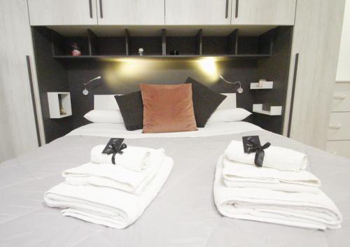Posteľ alebo postele v izbe v ubytovaní B&B Elles con parcheggio interno