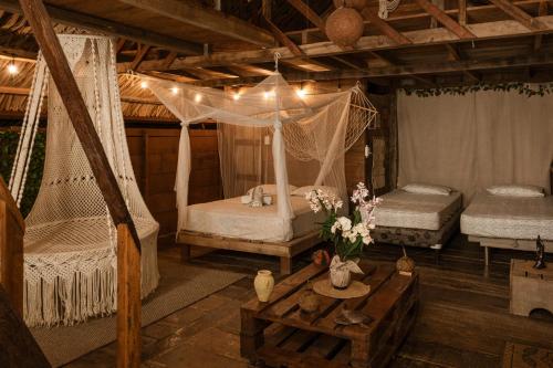 Postel nebo postele na pokoji v ubytování Bayano Ecolodge