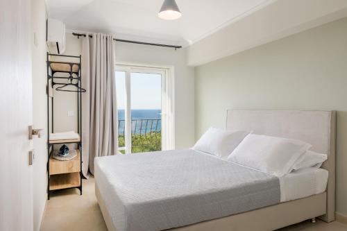 Ένα ή περισσότερα κρεβάτια σε δωμάτιο στο Restia tower apartments