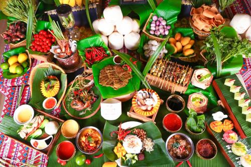a table topped with lots of different types of food at Kempinski Hotel Fuzhou in Fuzhou