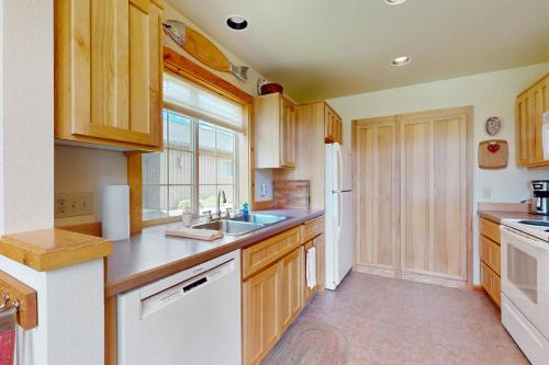 Η κουζίνα ή μικρή κουζίνα στο The Cozy Chalet