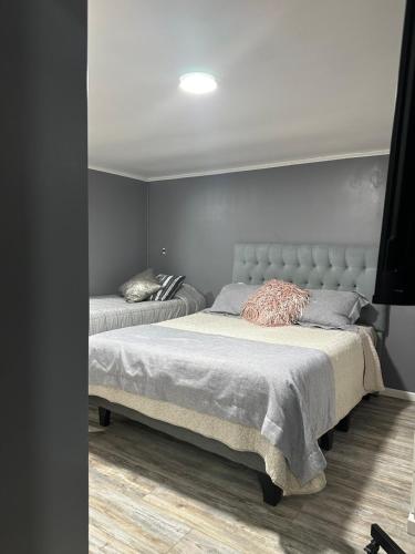 Ένα ή περισσότερα κρεβάτια σε δωμάτιο στο Casa Fuerteventura