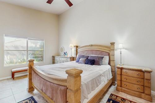 a bedroom with a large bed and a window at Avondale Abode in Avondale