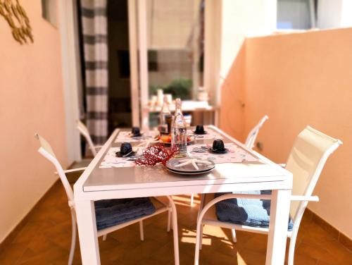 Photo de la galerie de l'établissement La Maisonette - Centro storico, à La Maddalena