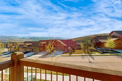 a view of a house from a fence at High Line View in Kamas