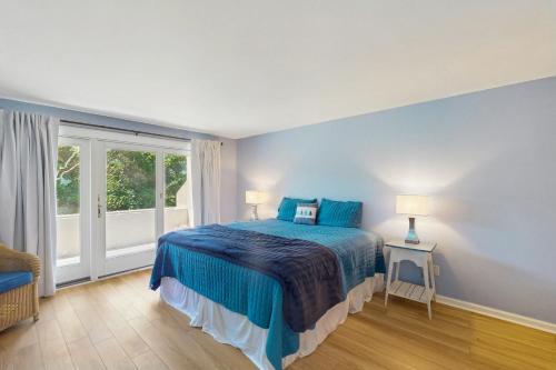 Ένα ή περισσότερα κρεβάτια σε δωμάτιο στο Beachwalk 104