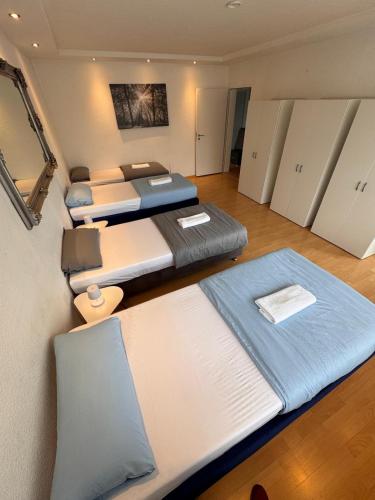 Postel nebo postele na pokoji v ubytování Stilvolle Unterkunft mit modernem Flair und viel Platz für gemeinsame Erlebnisse