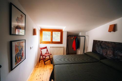 Postel nebo postele na pokoji v ubytování PinoLentejas Mountain Hostel