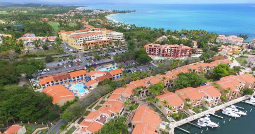 an aerial view of a resort next to the water at Park Royal Homestay Club Cala Puerto Rico in Humacao