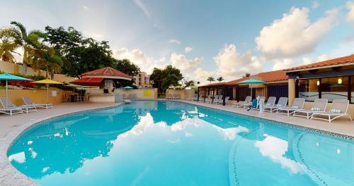 Bazén v ubytování Park Royal Homestay Club Cala Puerto Rico nebo v jeho okolí
