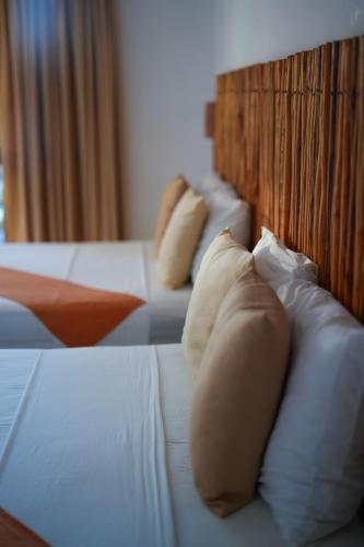 Cama o camas de una habitación en Mis Sueños Holbox