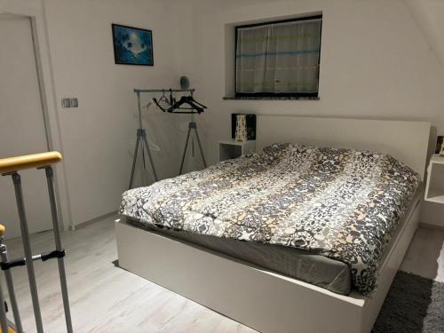 a bedroom with a bed in a room at Villa Sandra in Rude
