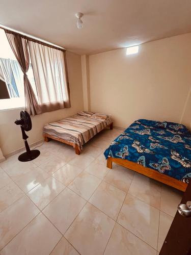 a bedroom with a bed and a window at Cri 40 in Tena
