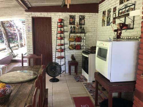 Kuchyň nebo kuchyňský kout v ubytování Chalé Romântico