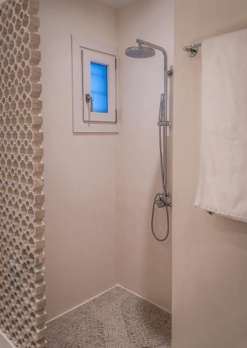 Koupelna v ubytování Vilos Suites
