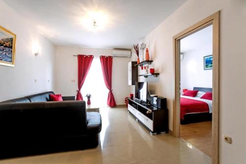 Ένα ή περισσότερα κρεβάτια σε δωμάτιο στο Villa Dusanka