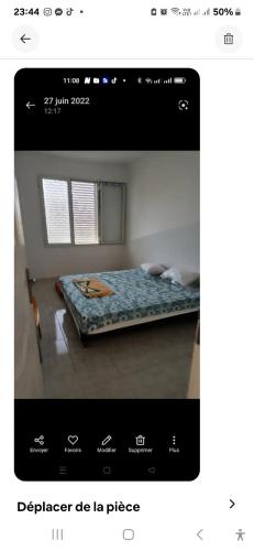 Postel nebo postele na pokoji v ubytování Appartement agréable