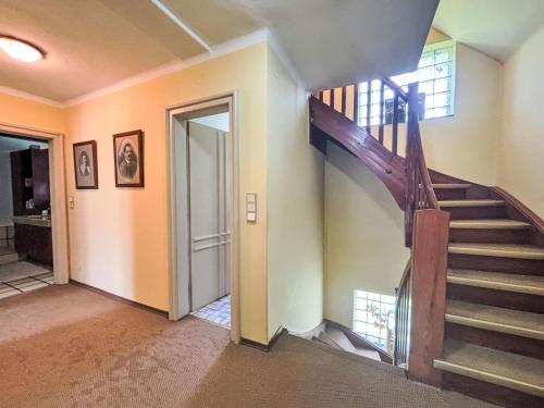 a hallway with a staircase in a house at Holiday Home Haus Sophie by Interhome in Schladming