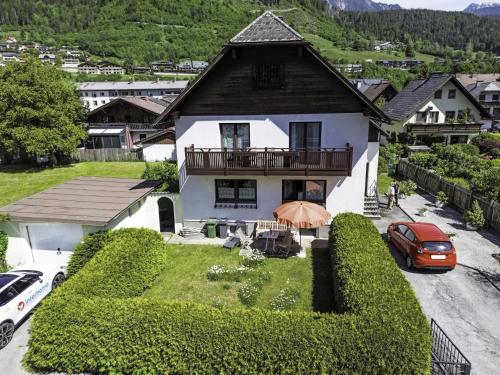 an aerial view of a house with cars parked in the driveway at Holiday Home Haus Sophie by Interhome in Schladming