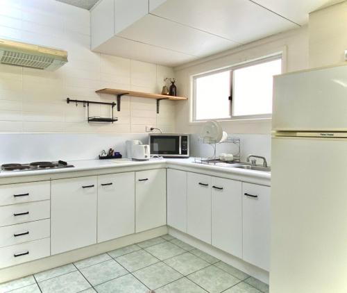 Cuisine ou kitchenette dans l'établissement Hides Hotel