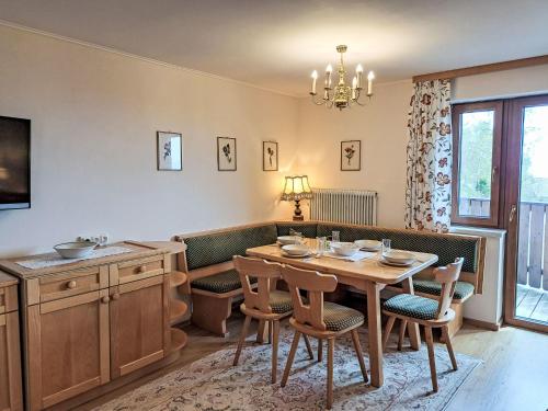 a dining room with a table and chairs at Apartment Simonhöhe Veitsberg by Interhome in Sankt Paul
