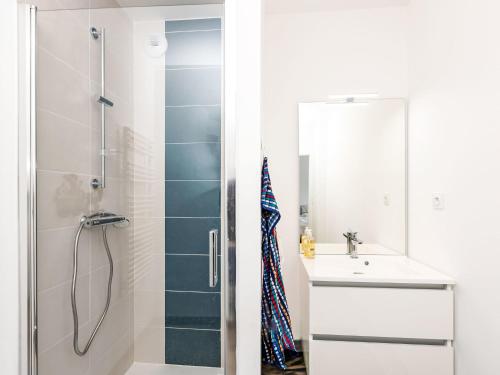 a bathroom with a shower and a sink at Apartment Colette by Interhome in Saint-Coulomb