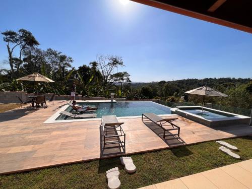 Πισίνα στο ή κοντά στο Chácara Oásis Araçariguama, Natureza, Piscina Incrível e Sossego