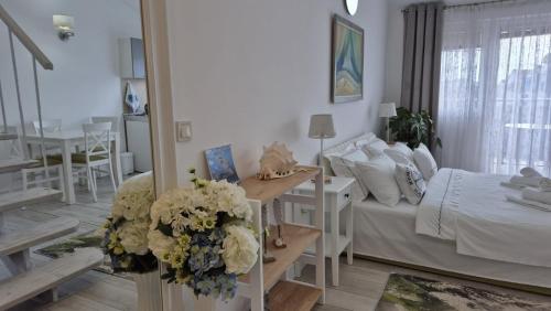 Postel nebo postele na pokoji v ubytování Egon Apartments