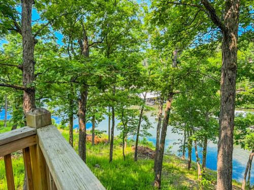 a wooden fence with a view of a lake at Treetop- Timberline Terraceunit29- Four Seasons in Four Seasons