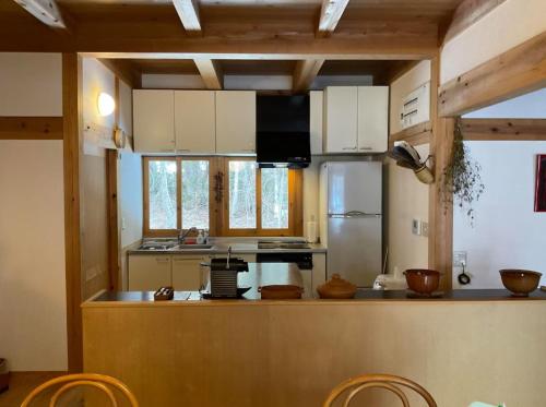 Kuchyň nebo kuchyňský kout v ubytování Villa Iizuna highlands - 飯綱高原の山荘 -