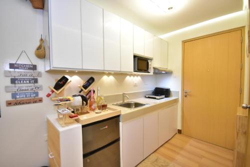 Dapur atau dapur kecil di Le Marii Suites - Trees Residence