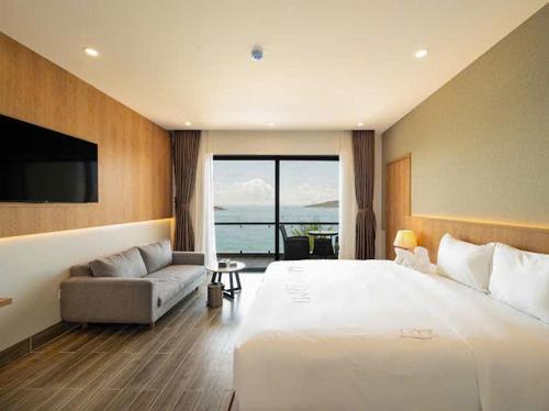 Postel nebo postele na pokoji v ubytování Quy Nhon Sea Resort