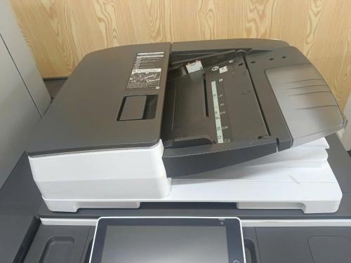 a computer printer sitting on top of a desk at Hotel Soco in Da Nang