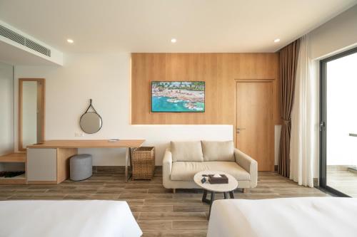 Postel nebo postele na pokoji v ubytování Quy Nhon Sea Resort