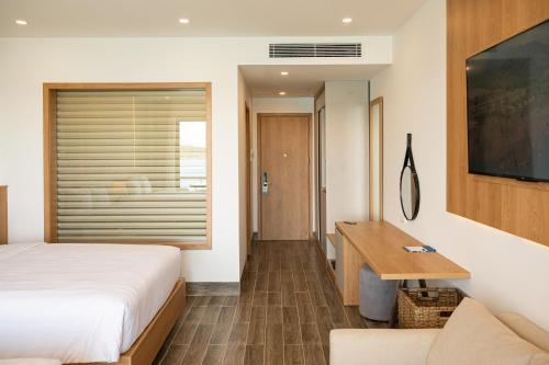 Postel nebo postele na pokoji v ubytování Quy Nhon Sea Resort