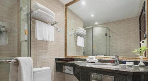 Koupelna v ubytování Dengfeng Chanwu Hotel