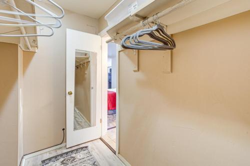 a hallway with a door leading to a room at Sedona Retreat Central & Cozy Red Rock Views in Sedona