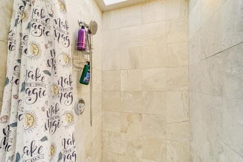 a bathroom with a shower with a shower curtain at Sedona Retreat Central & Cozy Red Rock Views in Sedona