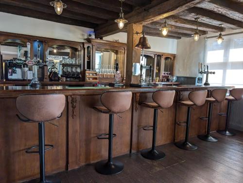 Ο χώρος του lounge ή του μπαρ στο A historic Pub with a modern twist - The Greyhound