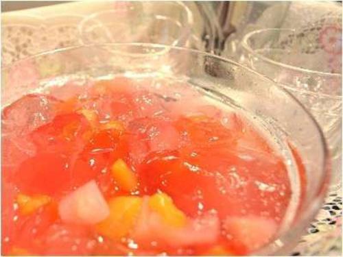 a glass bowl filled with fruit on a table at Hotel Green Selec in Sendai