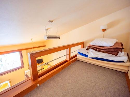 Ένα ή περισσότερα κρεβάτια σε δωμάτιο στο Lodge Scole
