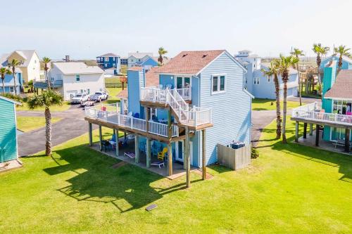 an aerial view of a house in a residential neighborhood at Coastal Casa in Port Aransas
