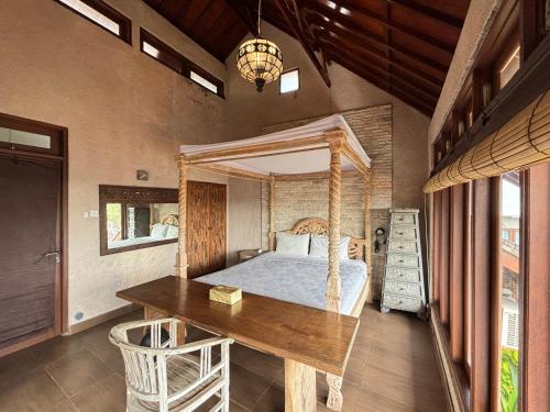 En eller flere senge i et værelse på Natural and Cozy Pool, Villa Dayins Balangan